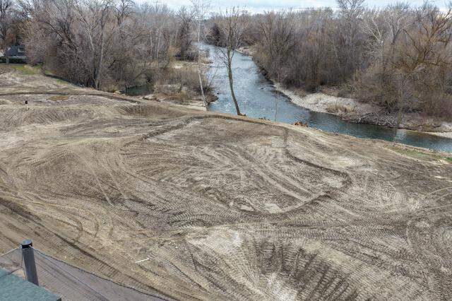Architect Brian Curley raised the elevation of The River Club’s 13th and 18th greens to foster better views of the Boise River.